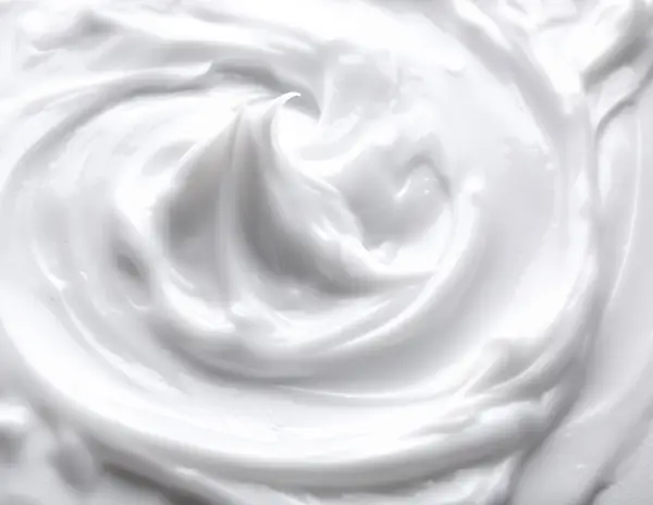 Glob of white body lotion