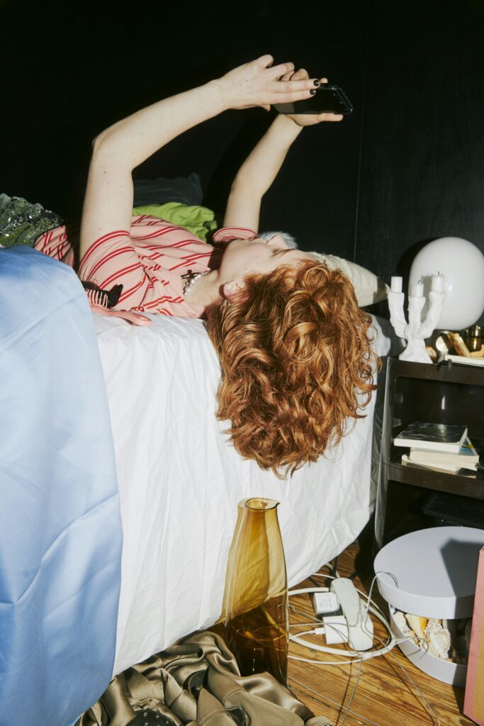 woman at home on the phone on social media